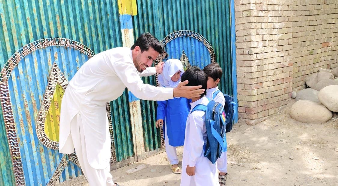 Children studying in an outdoor classroom